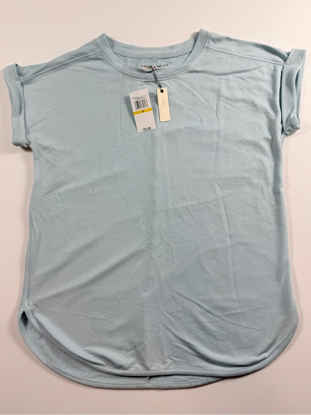 Cupio Blush NWT Soft Knit Blue Short Sleeve Top Medium Rolled Cuff High Low Hem